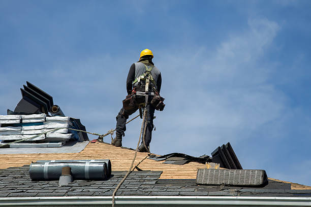 Professional Gutter Installation technician working in Olga, WA